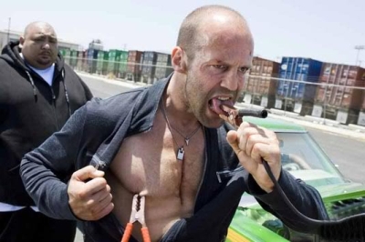 Jason Statham image of jason statham with battery charger attached to nipple and tongue (from the movie Crank 2)